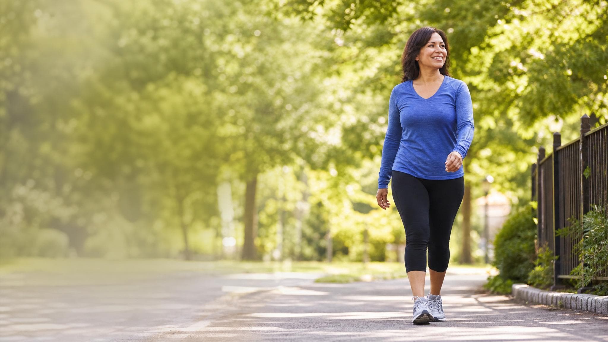 Patient walking comfortably outdoors after non-surgical care for knee pain and shoulder pain at M&S Vascular and Orthopedic Group